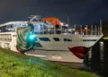 River cruise ship bumps into bridge in Amsterdam