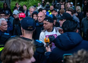 Water cannon and roadblocks deployed as asylum riots continue